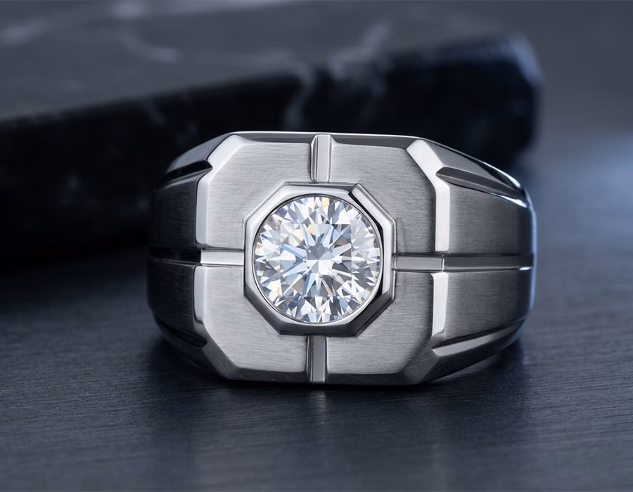 Macro shot of a luxury 316L stainless steel ring with a brushed finish, flush-set with a high-refractive cubic zirconia stone, showcasing professional jewelry craftsmanship.